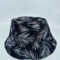 Black bucket hat with white palm leaf print, shown front-facing against a plain light background - M (56-58cm) / Black Base White Palm Leaf Style (40)