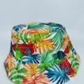 White bucket hat with colorful tropical leaf print, shown as a single item on a plain background - M (56-58cm) / White Base Multicolor Tropical Leaf Style (43)