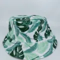 White bucket hat with green tropical leaf print, shown from the front in a simple product view - M (56-58cm) / White Base Full Green Leaf Print Style (44)