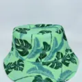 Green bucket hat with an all-over tropical leaf print, shown from the front on a plain background - M (56-58cm) / Green Full Leaf Print Style (46)