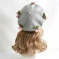 Gray wool-felt beret with pink pom-pom cherry accents and green leaves, shown on a display head - M (56-58cm) / Pink Cherry Light Gray Hat