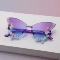 Ansicht violett-blau verlaufender Brillengläser mit bunten, erhabenen Blumen an den Rändern - Schmetterlingsrahmen (Erwachsene Schmetterling) / Lila-Blau-Verlauf
