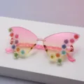 Detail of glittering flower accents on pink-to-yellow gradient lenses and transparent pink temples - Pink to Yellow Gradient