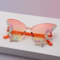 Randlose Schmetterlingsbrille mit orangefarbenen Verlaufsgläsern und bunten Blüten an den Bügeln - Schmetterlingsrahmen (Erwachsene Schmetterling) / Orange-Gelb-Verlauf