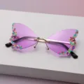 Gros plan sur les verres papillon violets dégradés, le pont doré et les perles colorées aux bords - Mauve Clair