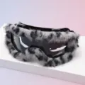 Dark mirrored lenses and thick gray-black faux-fur trim displayed on a white platform - Black Frame Leopard Fur Edge