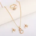 Gold-tone swan-shaped pieces with pearl and crystal accents arranged on a pale display surface. - Gold Swan Jewelry Set (8547) / Gold