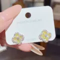 Yellow zircon four-leaf clover stud earrings with white zircon accents and silver-tone S925 posts - Yellow Clover (E0574)