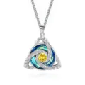 Detail of a silver triangular knot pendant with a yellow center stone and blue-green crystal accents - Square Pearl Chain / November Yellow