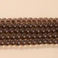 10mm (ongeveer 37 kralen) / Rookkwarts