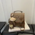 Brown plaid faux-leather handbag with top handle, buckle flap, crossbody strap and teddy charm - With Bear Pendant / Brown
