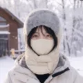 Winter trapper hat with integrated face mask and neck warmer, ivory with gray faux-fur trim - Beige
