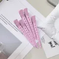 Pink metal duckbill hair clips with perforated bodies and tapered tips, arranged as a set - 5 Pieces/Pack / Light Pink