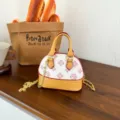 Mini sac coquillage en PU, base jaune, motif blanc et rose, bord rouge et chaîne dorée - Beige
