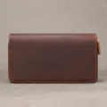 Front view of a dark brown leather wallet with textured surface, stitched edges and gold zipper pull - Style 9100 / Brown
