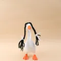 Oie décorative de table blanche, avec bec et pattes orange, tresses noires et nœuds en ruban blanc - Style Queue de Cheval Noire / Pour Oie de 7 Pouces