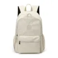 Leichter cremefarbener Nylon-Reiserucksack mit Reißverschlusstaschen und seitlichen Netztaschen - Khaki