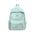 Sac à dos scolaire en nylon vert menthe clair, étoiles brodées, détails coquillage et étiquette ours - Sac Seul / Bleu