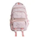 Sac à dos scolaire rose poudré avec plusieurs poches zippées à l’avant et des bretelles assorties - Sac Seul / Rose