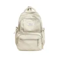 Sac à dos crème à pois, avec plusieurs poches zippées, présenté de face sur fond blanc - Kaki