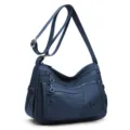 Sac bandoulière en nylon bleu foncé, poches zippées, poche latérale en mesh et sangle réglable - Bleu foncé