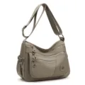 Sac bandoulière en nylon taupe avec plusieurs poches zippées et une sangle réglable - Kaki