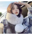 White fluffy fur neck warmer with a large pom-pom, modeled outdoors in natural light. - Light Gray