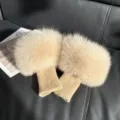 Beige knitted wrist warmers with fluffy light fox fur cuffs, shown as a matching pair - Milk Tea