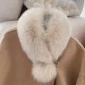 Ivory fluffy fox-fur style scarf with a matching pom-pom detail, shown on a coat - Khaki With Pom Pom