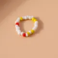 Anello di Perline Bianco Giallo