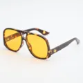 Tortoiseshell leopard-print double-bridge sunglasses with yellow lenses, shown at a 45-degree angle - UV400 Protection / Tortoiseshell Frame Yellow Lens