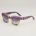 Multicolor cat-eye sunglasses with pink leopard-print arms and gradient gray lenses, angled view - Purple Tortoise Double Grey Lens