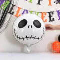 Close-up of a white foil balloon with a stitched black skull face at a Halloween party - Skull Foil Balloon / 2 Pieces Set (18 Inch)