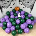 Dark green and purple round balloons arranged beneath Halloween spiderwebs, bats, pumpkin and ghost - Matte Purple and Matte Dark Green