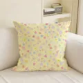 Square cushion cover with tiny multicolor floral print on a soft yellow ground, styled on a sofa - Pillow Case Only (SBZA315401) / 35x35cm / Yellow Floral