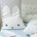 White rabbit-shaped cushion with gray stars and a simple face, styled with snowflake bedding - 50x30cm (Without Core) / White