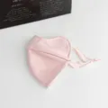 Pink contoured winter face mask with adjustable tie straps, shown on a clean white surface - One Size / Rose Pink (WHMK3297-A)