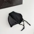 Black winter face mask in soft fabric with adjustable drawstrings on a white surface - One Size / Premium Black (WHMK3297-B)