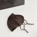 Warm winter face mask in deep brown soft fabric, shown flat with adjustable drawstring ties - One Size / Dark Brown (WHMK3297-C)