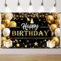 Black and gold birthday party backdrop with printed balloons, stars and gifts, shown hanging - Style SBJ-002 / 95x75cm