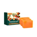 Three orange persimmon soap bars with illustrated box packaging, arranged on a clean white background - Persimmon Cleaning Soap Bars With Foaming Nets / Bars Included