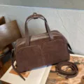Brown suede bag with leather trim, twin handles, silver zippers and a detachable strap on books - 30x11x17cm / Coffee