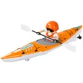 Orange and white toy kayak with paddles and a helmeted figure, shown on a white background - Orange