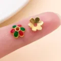 Coupelles fleuries dorées pour perles, l’une émaillée rouge et vert, l’autre unie, avec trou central - Calotte Fleur à Six Pétales (28573)