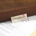 Beige Artistic Text (CAT'S CURVE ISLE)