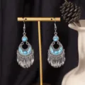 S4287-1 Boucles d'oreilles à pompons en perles de rocaille bleues