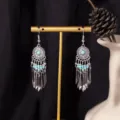 S4295 Boucles d'oreilles à pompons en perles de rocaille bleues