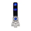 Silver filigree medallion with blue crystals and dangling bell tassels on a black velvet display - Sapphire Blue