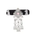 Ornate silver-tone openwork ornament with a pink center stone and dangling bell tassels - Pink