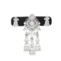 Ornate silver-tone ornament with clear stones, dangling bells and tassel-like chains on display - Clear